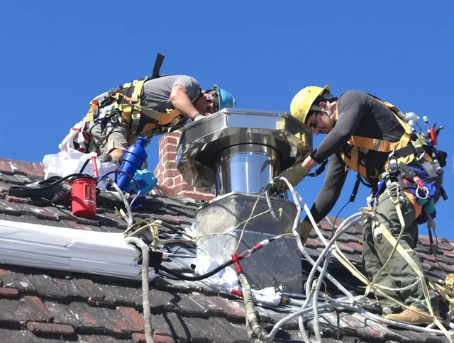 Protective chimney cap installed by North Branford Chimney Sweep in North Branford, CT