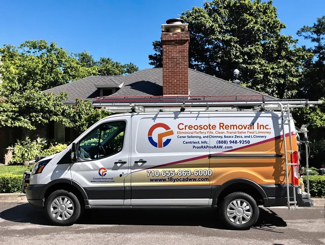 North Branford Chimney Sweep technician removing creosote safely in North Branford, CT